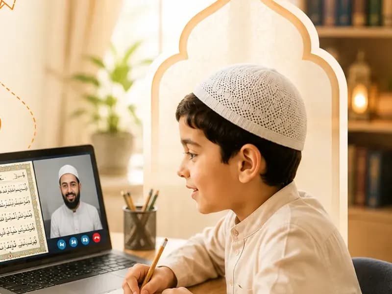 A boy memorising Quran with his teacher on a video call